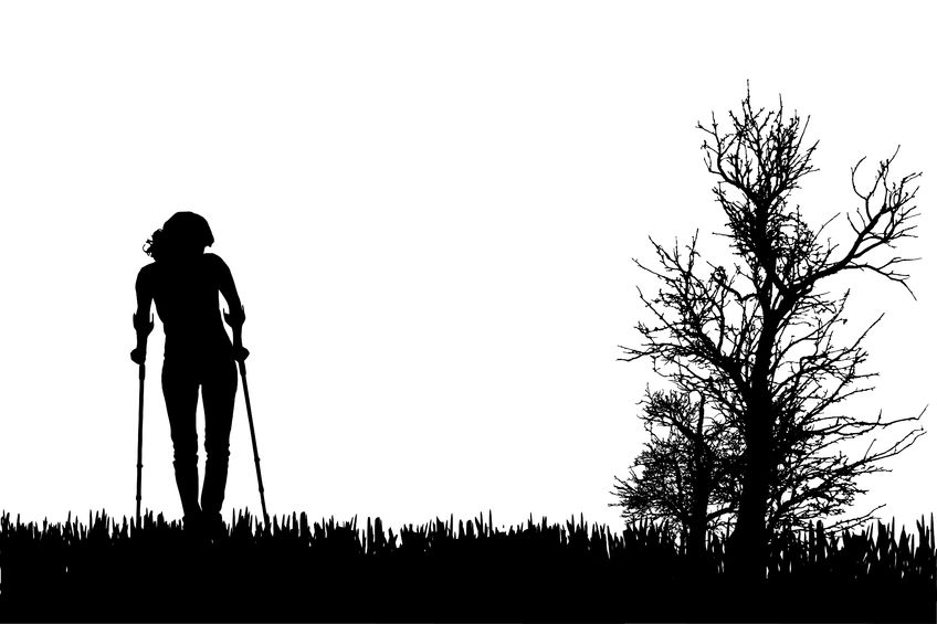 29381594 - vector silhouettes of people walking on crutches.